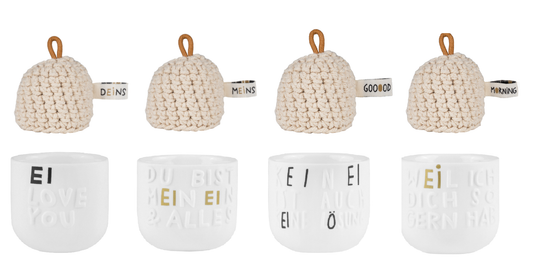 Eierbecher 4er-Set mit unterschiedlichen Motiven und 4 Mützen - Räder Design
